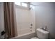 Clean and bright bathroom with a shower-tub combo and neutral decor at 11701 Hatchling Ave, Las Vegas, NV 89138