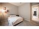 Comfortable bedroom with neutral paint, carpet, and soft natural light at 11701 Hatchling Ave, Las Vegas, NV 89138