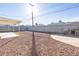 Low maintenance backyard with gravel, patio, awning, and block wall offering a private space at 119 Cedar St, Henderson, NV 89015