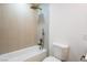 Bright bathroom featuring gold fixtures, including a rain shower head and built-in shelving at 119 Cedar St, Henderson, NV 89015