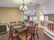 Open concept dining area with wood floors and modern lighting at 1276 Spanish Armada Rd, Las Vegas, NV 89123