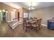 Open concept dining area with wood floors and modern lighting at 1276 Spanish Armada Rd, Las Vegas, NV 89123
