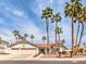 Lovely single-story home featuring a two-car garage, drought-tolerant landscaping, and mature trees at 1276 Spanish Armada Rd, Las Vegas, NV 89123