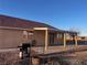 Exterior shot of home and backyard with patio at 1900 E Highland Ave, Pahrump, NV 89048