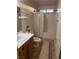 Bathroom with a sink vanity, toilet, and shower with shower curtain at 1900 E Highland Ave, Pahrump, NV 89048