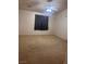 Spacious bedroom featuring neutral walls, carpet flooring, and a ceiling fan at 1900 E Highland Ave, Pahrump, NV 89048