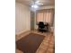 Bedroom with tile floors, desk, and a floor to ceiling cabinet at 1900 E Highland Ave, Pahrump, NV 89048