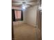 Bedroom with a ceiling fan, a window with blinds, and carpet at 1900 E Highland Ave, Pahrump, NV 89048