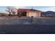 Charming single-story home with a well-maintained yard and two-car garage at 1900 E Highland Ave, Pahrump, NV 89048