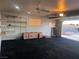 Garage with shelves and room for storage and activities at 1900 E Highland Ave, Pahrump, NV 89048