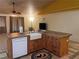 Charming kitchen island features a farmhouse sink and ample counter space for food preparation at 1900 E Highland Ave, Pahrump, NV 89048