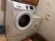 White Samsung washer and dryer in laundry room with tile flooring at 1900 E Highland Ave, Pahrump, NV 89048