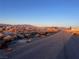 View down the street showcasing the rural Nevada surroundings at 1900 E Highland Ave, Pahrump, NV 89048