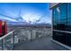 Private balcony with glass railings showcasing stunning views of the city and mountains at 2700 Las Vegas Blvd # 4306, Las Vegas, NV 89109