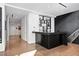 Modern bar area boasts sleek countertops, open shelving, and hardwood floors, perfect for entertaining guests at 2700 Las Vegas Blvd # 4306, Las Vegas, NV 89109
