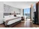 Bright bedroom features two queen beds, modern decor, and large windows with stunning city views at 2700 Las Vegas Blvd # 4306, Las Vegas, NV 89109