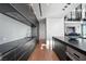 Modern kitchen featuring sleek countertops, stainless steel appliances, and wood flooring at 2700 Las Vegas Blvd # 4306, Las Vegas, NV 89109
