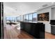 Contemporary living room featuring hardwood floors, city views, and ample natural light at 2700 Las Vegas Blvd # 4306, Las Vegas, NV 89109