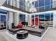 Bright living room featuring floor-to-ceiling windows, modern decor, a chandelier and a comfortable sectional sofa at 2700 Las Vegas Blvd # 4306, Las Vegas, NV 89109