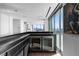 Stylish wet bar area with wine storage and a stunning city view beyond the window at 2700 Las Vegas Blvd # 4306, Las Vegas, NV 89109
