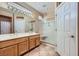 Bathroom features a double sink vanity with a glass-enclosed shower, providing a luxurious feel at 2715 Riceville Dr, Henderson, NV 89052