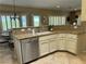 Kitchen featuring stainless steel appliances, tile floor, and granite countertops at 2715 Riceville Dr, Henderson, NV 89052