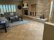 Cozy living room with modern decor and stone fireplace at 2715 Riceville Dr, Henderson, NV 89052