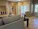 Living room featuring a stone fireplace at 2715 Riceville Dr, Henderson, NV 89052