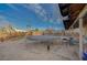 Large backyard with a trampoline, offering ample space for recreation and relaxation at 2716 Saint George St, North Las Vegas, NV 89030