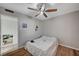 Bedroom featuring bed, ceiling fan, and closet at 2716 Saint George St, North Las Vegas, NV 89030