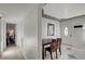 Entryway featuring tile floor, dining table, and view to a bedroom at 2716 Saint George St, North Las Vegas, NV 89030