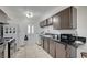 Functional kitchen featuring modern appliances, ample cabinet space, and tile flooring at 2716 Saint George St, North Las Vegas, NV 89030