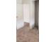 Cozy bedroom features neutral carpet, closet and doorway leading into the next room at 3231 Comitan Ln, Las Vegas, NV 89122