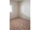 Carpeted bedroom with a sunlit window at 3231 Comitan Ln, Las Vegas, NV 89122