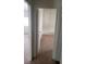 Hallway features neutral carpet, white walls and trim, with doors to other rooms at 3231 Comitan Ln, Las Vegas, NV 89122