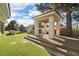 Outdoor dining area with a full kitchen island, perfect for relaxing and entertaining at 42 Sawgrass Ct, Las Vegas, NV 89113