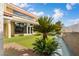 Backyard featuring lush greenery and an outdoor bar with lots of natural light at 42 Sawgrass Ct, Las Vegas, NV 89113