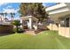 Backyard featuring a gazebo on top of stairs with turf at 42 Sawgrass Ct, Las Vegas, NV 89113