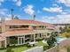 View of the backyard with the pool, manicured backyard and covered terrace at 42 Sawgrass Ct, Las Vegas, NV 89113