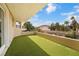 Outdoor balcony with artificial grass flooring and neighborhood views at 42 Sawgrass Ct, Las Vegas, NV 89113