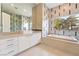 Bathroom with jacuzzi tub and large vanity with tons of storage at 42 Sawgrass Ct, Las Vegas, NV 89113