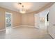 Bedroom with hardwood flooring and ensuite bathroom with jacuzzi tub at 42 Sawgrass Ct, Las Vegas, NV 89113