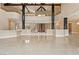 Expansive living room features marble floors, high ceilings, and distinctive architectural columns at 42 Sawgrass Ct, Las Vegas, NV 89113