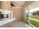 Cozy living space features sleek fireplace and balcony access at 42 Sawgrass Ct, Las Vegas, NV 89113