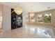 Elegant living room features marble floors, modern lighting, and a decorative accent wall at 42 Sawgrass Ct, Las Vegas, NV 89113