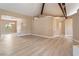 Spacious living room featuring light wood floors and architectural details at 42 Sawgrass Ct, Las Vegas, NV 89113