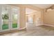 Sun-filled living room with doors leading to outdoor terrace at 42 Sawgrass Ct, Las Vegas, NV 89113