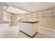 Well-organized walk-in closet featuring a central island with drawers and shelves at 42 Sawgrass Ct, Las Vegas, NV 89113