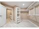 Walk-in closet with custom shelving and drawers at 42 Sawgrass Ct, Las Vegas, NV 89113