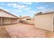 Large brick patio with a covered terrace and shed in the backyard at 4464 Halbert Ave, Las Vegas, NV 89110